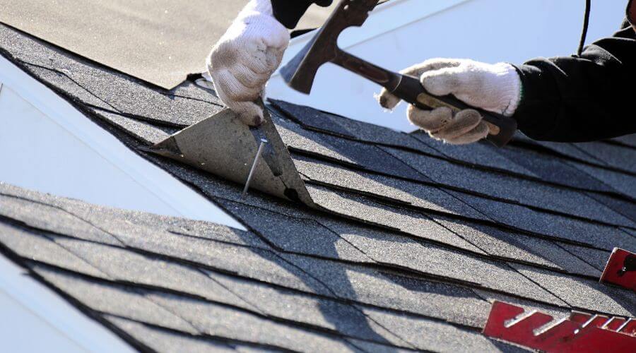 Expert tile roof repair services in Bouton, IA